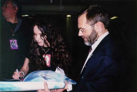 Sarah signs the program